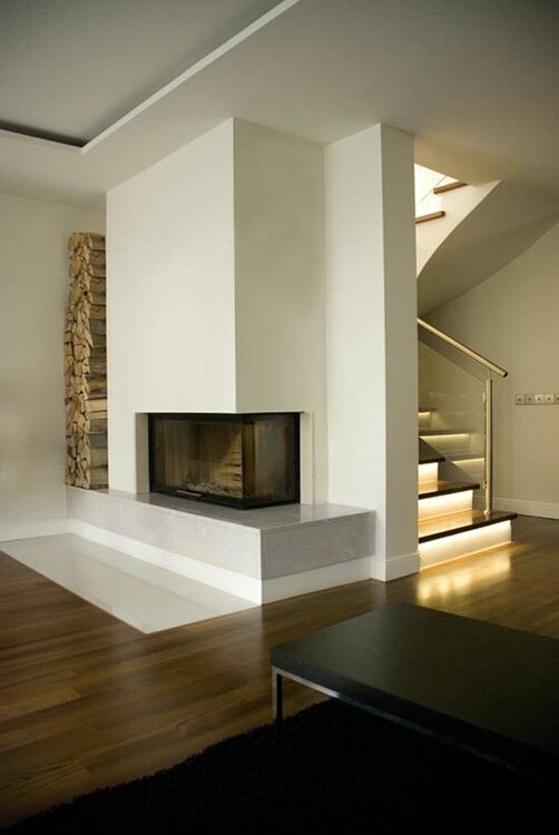 03-Warm-House-Contemporary-Fireplace-Design-With-Minimalist-Storage.thumb.jpg.d05644fbe9358f567da50630ed1f1eea.jpg