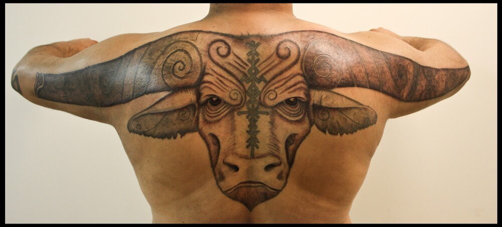 Best-Bull-Head-Tattoo-On-Upper-Back-And-Sleeves.thumb.jpg.8f4f25bd54ce774fb4018347674aad5e.jpg
