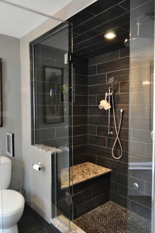 Gorgeous-black-tiled-shower-with-built-in-bench.thumb.jpg.2652d75e0093972ff4c10f2515981a2e.jpg